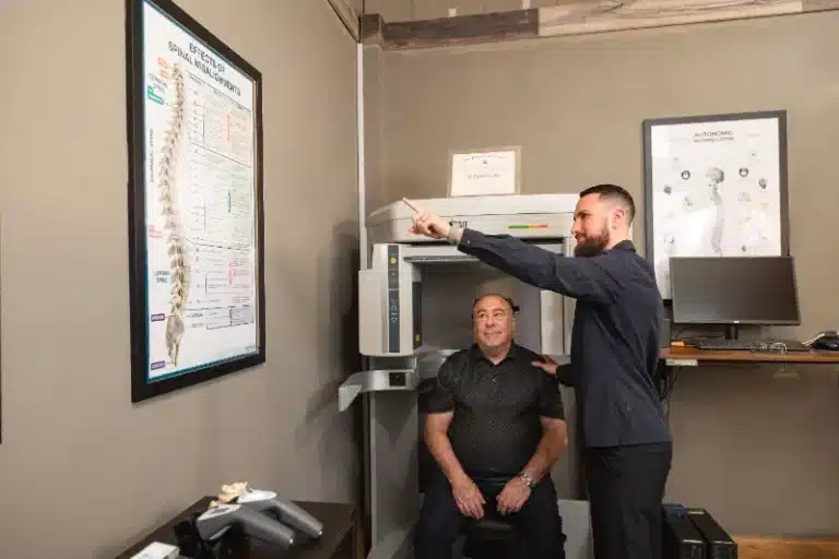 Us 5 Patient clinic consultation for chiropractic care - Graceful Pompano Beach Chiropractic